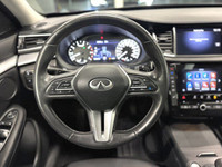 The 2021 Infiniti QX50 Luxe presents a compelling combination of power and sophistication with its e... (image 7)