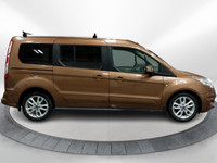 Very rare and leather-loaded! This 2014 Ford Transit Connect Titanium is a unique one-owner Alberta... (image 1)