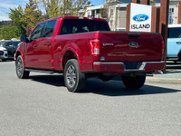 This 2015 Ford F-150 XLT has a Ruby Red Metallic exterior and Black Sport Interior with seating for... (image 4)