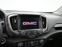 The 2023 GMC Terrain AT4 is a rugged compact SUV with a 1.5L turbocharged engine, all-wheel drive, a... (image 5)
