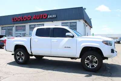 WELL MAINTAINED 6 SPEED STICK SHIFT Elevate Your Adventures with the Toyota Tacoma Sport Double Cab....
