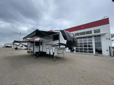 EAST TO WEST Tandara half-ton fifth wheel 28RL-OK highlights: Theater Seating Free-Standing Dinette...