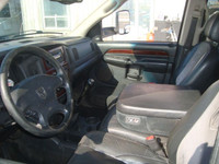 NORTH POINT MOTORS...CALL TEXT 780-224-7791 CHECK OUT THIS 03 DODGE RAM 3500 QUAD CAB 4X4 DRW 5.9L C... (image 4)
