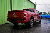 This 2022 Ford F-150 is for sale today. This Crew Cab 4X4 pickup has 71,247 kms. It's red in colour... (image 2)