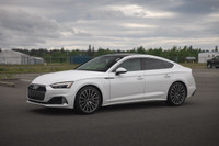 Equipped with a 261 hp 2.0L turbo, 7-speed S tronic, Quattro AWD, and mild hybrid efficiency. Dealer... (image 4)