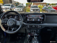 This Jeep Wrangler has a trusty Regular Unleaded V-6 3.6 L/220 engine powering this Manual transmiss... (image 9)