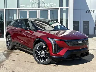 Finished in a head-turning Radiant Red Tricoat with a sleek Noir interior, the 2025 Cadillac Optiq E...