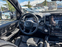 Only 12,000 Miles! This Ram 1500 delivers a Gas/Electric V-8 5.7 L/345 engine powering this Automati... (image 8)