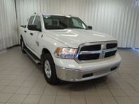Drive our 2022 RAM 1500 Classic Tradesman Crew Cab 4X4 in Bright White and start taking care of busi... (image 1)