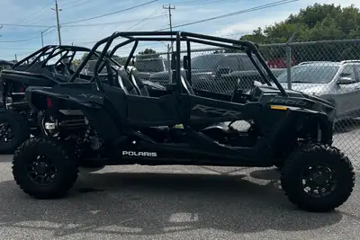 2023 RZR 1000 4 SPORT. TAKE THE WHOLE FAMILY IN THIS ONE. READY TO GO! CALL FOR DETAILS. AGGRESSIVE...