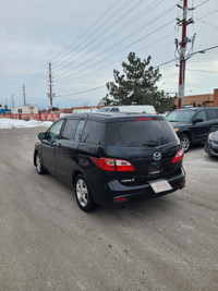 This stylish 2016 Mazda MAZDA5 Touring is a reliable and spacious wagon that's perfect for your dail... (image 2)