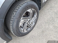 This 2022 Hyundai Santa Fe Preferred SUV boasts a sleek Shimmering Silver exterior and a sophisticat... (image 8)