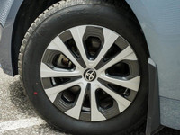 This Toyota Corolla boasts a Gas/Electric I-4 1.8 L/110 engine powering this Variable transmission.... (image 9)