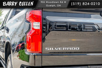 Experience the power and elegance of the black Chevrolet Silverado 1500 High Country, equipped with... (image 6)