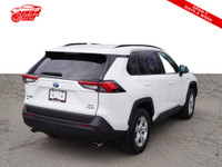 Check out this stylish and fuel-efficient 2020 Toyota RAV4 Hybrid XLE! With its sleek white exterior... (image 6)
