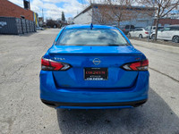 Buckle up, because this 2023 Nissan Versa SR CVT in Electric Blue Metallic isnt just a carits your t... (image 5)