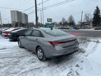 The 2023 Hyundai Elantra is a modern and stylish compact sedan that stands out with its bold design... (image 4)