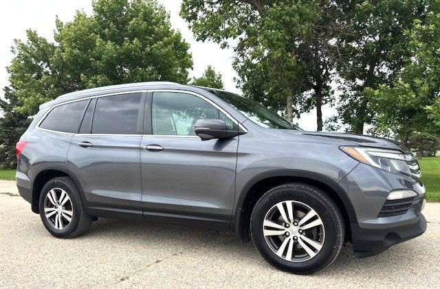 2016 Honda Pilot EX-L AWD *LEATHER - NAVIGATION - WARRANTY INCL* in Cars & Trucks in Winnipeg