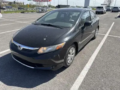 PRIX ET QUALITÉ IMBATTABLE venez découvrir notre HONDA BERLINE CIVIC 2012 LX BAS KM A/C MODE ÉCO BLU...