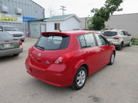 All our listed prices are cash price plus tax. 2010 Nissan Versa SL comes with Cloth Interior, Tract... (image 4)