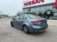 Experience impressive efficiency and advanced technology with the 2022 Toyota Corolla Hybrid LE. Pow... (image 2)