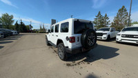 This 2025 JEEP WRANGLER 4-DOOR SAHARA has the following options Cloth Low-Back Bucket Seats, Remote... (image 1)