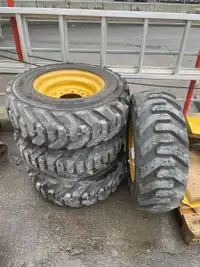 USED CATERPILLAR SKIDSTEER / WHEEL LOADER TIRE AND RIMS FOR SALE