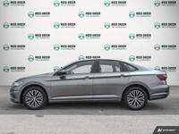 Meet the 2021 Volkswagen Jetta Comfortline in a stunning gray finish, featuring a Front-Wheel Drive... (image 3)