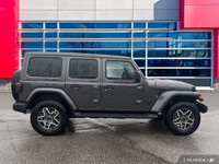 This Jeep Wrangler has a strong Regular Unleaded V-6 3.6 L/220 engine powering this Automatic transm... (image 7)