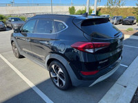 KBB.com 10 Best SUVs Under $25,000. This Hyundai Tucson boasts a Intercooled Turbo Regular Unleaded... (image 2)