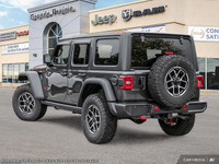 This Jeep Wrangler delivers a Regular Unleaded V-6 3.6 L/220 engine powering this Manual transmissio... (image 4)