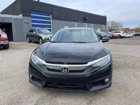 2016 Honda Civic touring comes with Push button, Navigation, backup cameras, sunroof, heated seats,... (image 9)