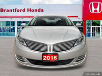 Experience effortless elegance with this 2016 Lincoln MKZ. Boasting a sleek silver exterior and a me... (image 8)
