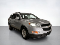 An ideal blend of size, comfort, and performance, our 2011 Chevrolet Traverse 2LT AWD shown in Silve... (image 6)