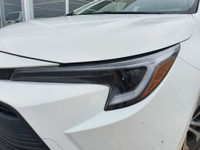 Check out this 2023 Toyota Corolla Hybrid LE CVT with 27,670 KMS, finished in a sleek White exterior... (image 6)