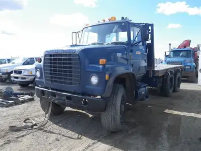1981 Ford LT900 Tandem Axle Flatbed Truck PARTS ONLY Contact us for pricing on specific parts. Power...