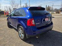 VERY WELL DRIVING SHARP LOOKING IMPACT BLUE ON BLACK FORD SPORT UTILITY VEHICLE W/ GOOD MILEAGE, EQU... (image 2)