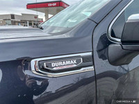 The 2024 GMC Sierra includes adaptive cruise control, a heated steering wheel, and leather seats wit... (image 8)