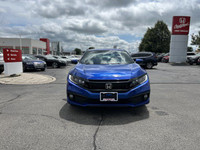 This Aegean Blue Metallic 2021 Honda Civic Sedan Sport is a head-turner. Boasting a low 39,352 kilom... (image 1)