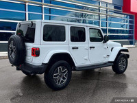 This Jeep Wrangler has a trusty Regular Unleaded V-6 3.6 L/220 engine powering this Automatic transm... (image 6)