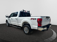 Looking for towing power and a truck that packs a punch? This WHITE Ford Super Duty pickups offer a... (image 2)