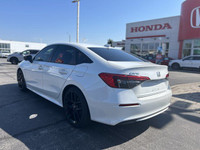 This 2022 Honda Civic Sedan Sport shines in Platinum White Pearl, boasting a sporty profile and a su... (image 5)