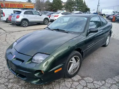 Call 416-648-0721 - ONE OWNER - Runs great - 2000 Pontiac Sunfire 5-speed manual transmission 2 door...