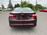 LOWS KMS / NAVIGATION SYSTEM / SUPER CLEAN CAR! HELLO OTTAWAAAAA! WE FINANCE EVERYONE! No hidden fee... (image 4)