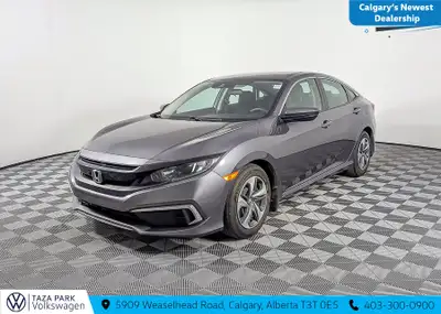 Roll up in style in our Accident Free 2021 Honda Civic LX Sedan that's stunning in Modern Steel Meta...