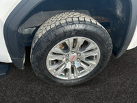The All New GMC Sierra has been redefined from Hood to Hitch. This 4WD White Sierra is a Crew Cab Pi... (image 8)