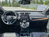 This Honda CR-V delivers a Intercooled Turbo Regular Unleaded I-4 1.5 L/91 engine powering this Vari... (image 9)