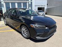 The 2022 Honda Civic EX Sedan is powered by a 1.5L turbocharged 4-cylinder engine paired with a CVT,... (image 7)