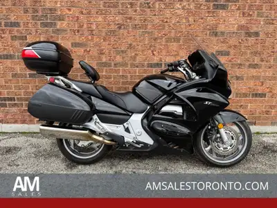 SUPER CLEAN Honda ST1300 with ONLY 8,000 KM! GIVI Maxia top case, Sargent seat, heated grips, MCL hi...