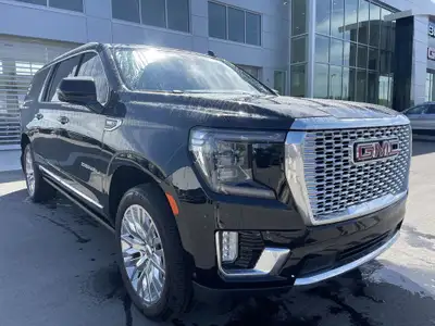 The 2023 GMC Yukon XL Denali is a full-size SUV that redefines luxury and capability, offering an ex...